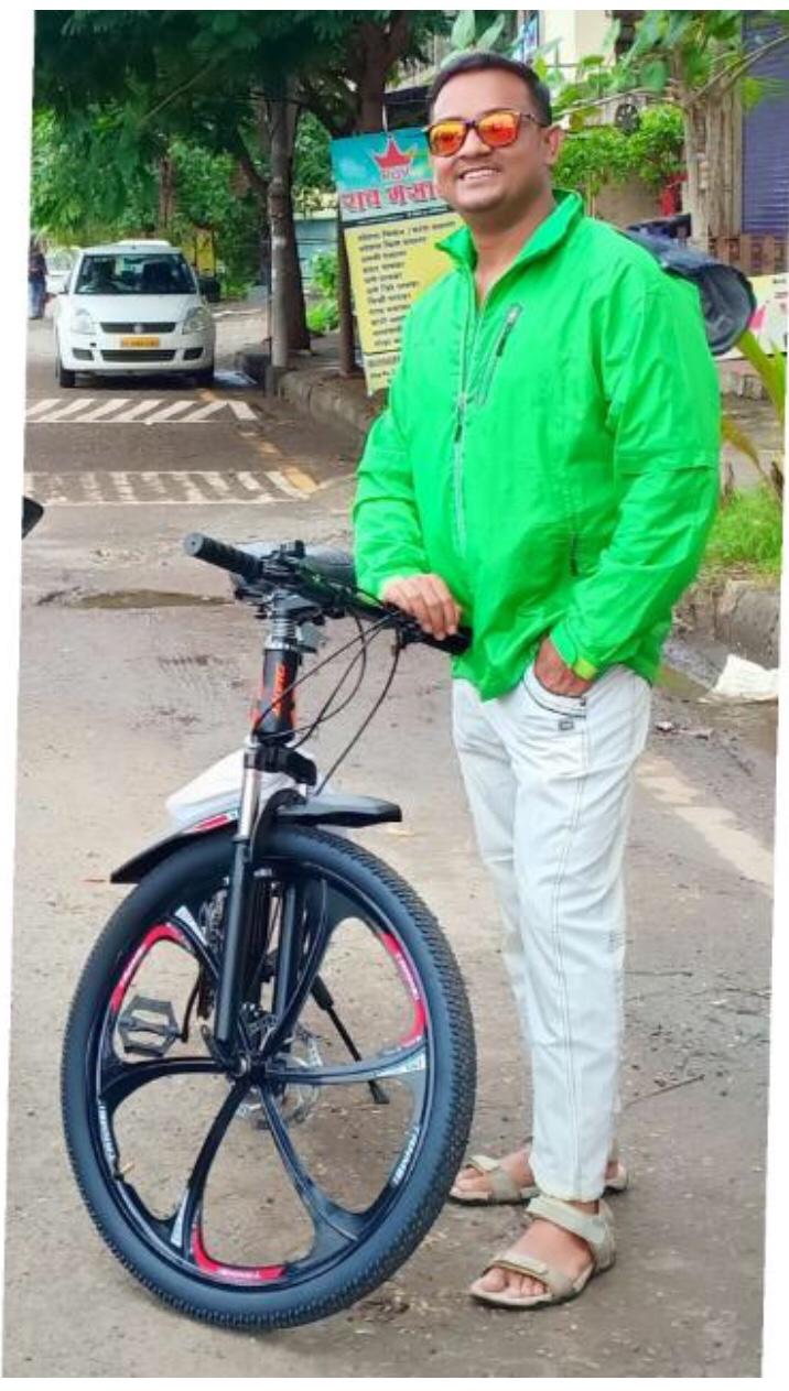 Customer-shared photo from India of a person beside a mountain bicycle