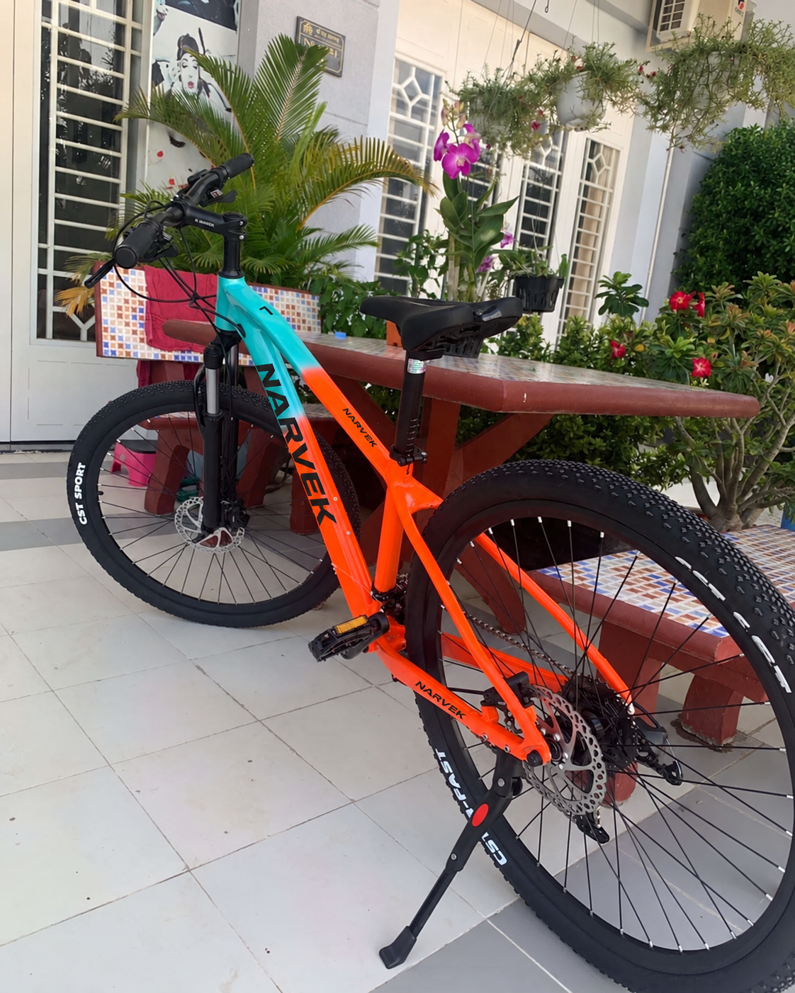 Customer-shared photograph from Malaysia of an orange NARVEK bicycle